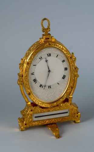 Horology  - A Victorian Gilt Brass Cheval Strut Clock