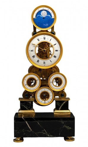 Une pendule astronomique calendrier squelette d'époque Empire