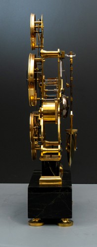 Horlogerie Pendule - Une pendule astronomique calendrier squelette d'époque Empire