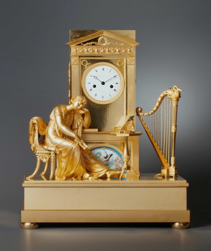 An Empire gilt bronze mantel clock with a Paris porcelain by Boileau - Horology Style Empire