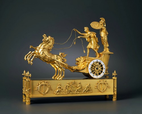 An Empire gilt bronze chariot clock of eight day duration housed  - Horology Style Empire