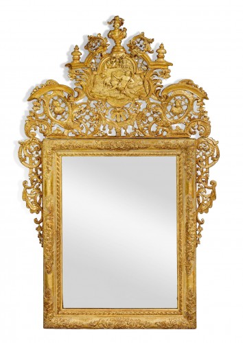 A Venetian Baroque carved giltwood ceremonial mirror