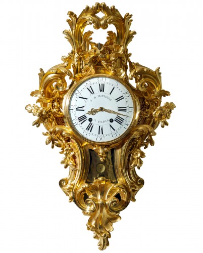 A Louis XV gilt bronze cartel clock by Jean-Baptist II Dutertre