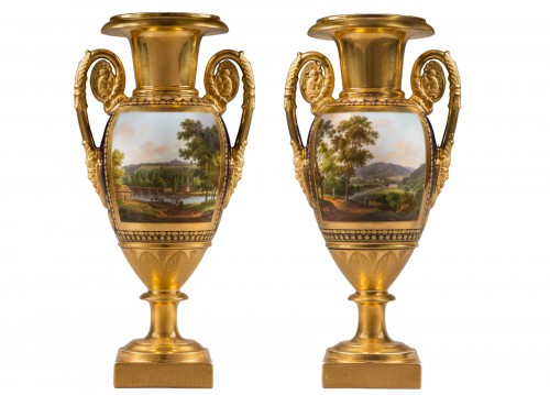 A pair of Restauration gilt and polychrome two-handled vases