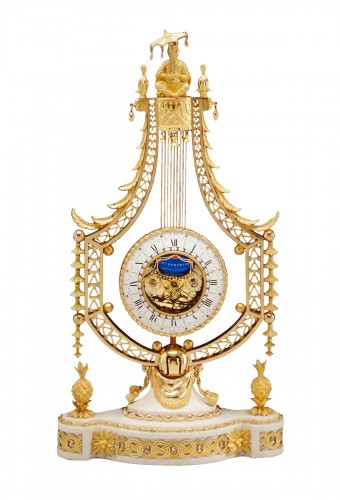 A Louis XVI lyre clock by Joseph-Charles-Paul Bertrand