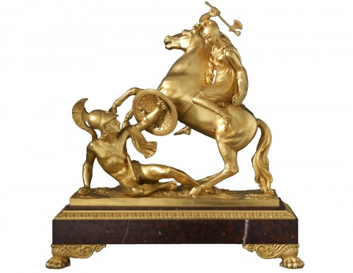 An Empire gilt bronze and rouge griotte marble statuette of Amazonomachy