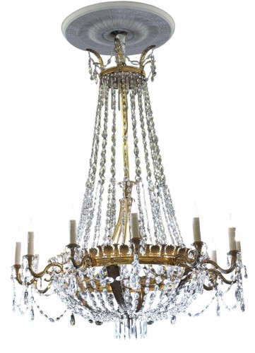 An Empire gilt bronze and cut-glass twelve-light chandelier