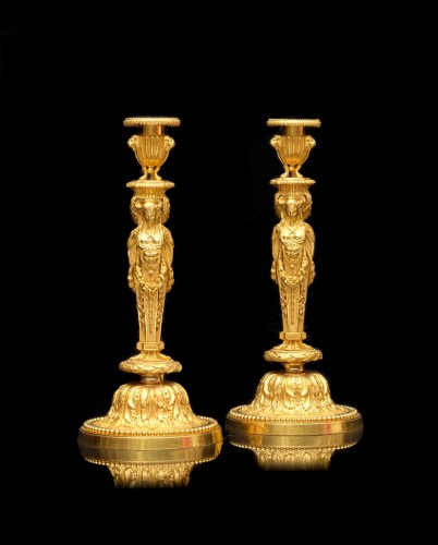 A pair o bronze candlesticks circa 1820 after a model by Jean-Démosthène Dugourc - Lighting Style Restauration - Charles X