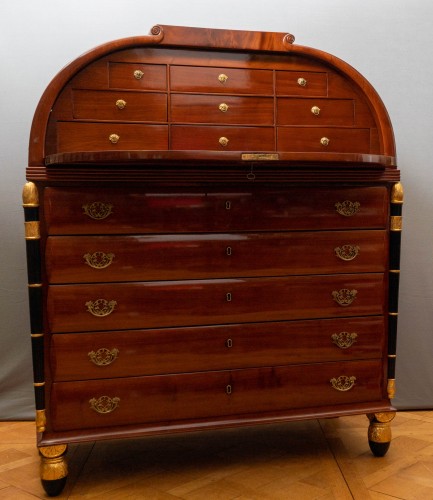 Furniture  - A Russian Empire parcel gilt and ebonised mahogany bureau commode