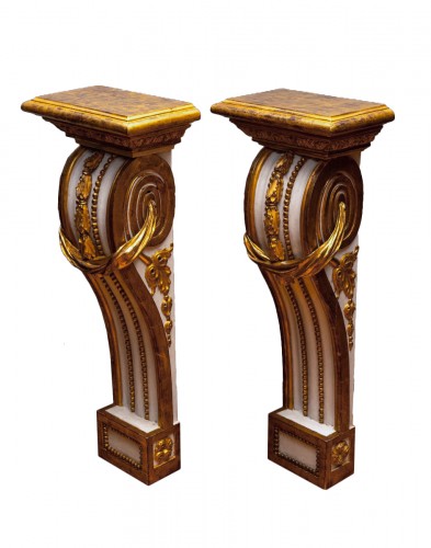 Pair of Louis XVI painted and giltwood consoles