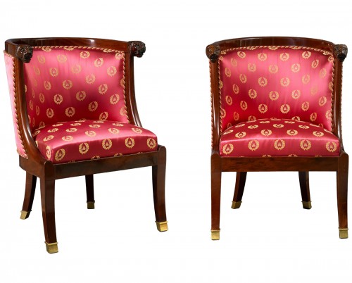 A set of four mahogany Empire fauteuils