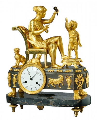 An Empire clock of eight day duration