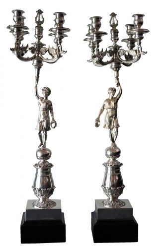 A pair of Empire four-light candelabra