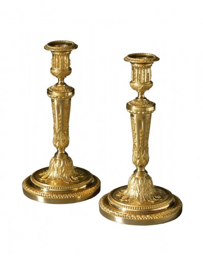 A pair of Louis XVI candlesticks