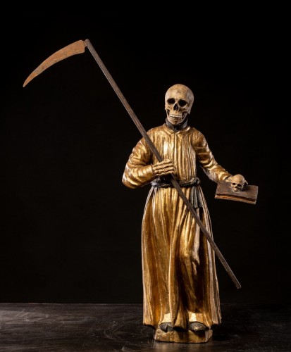 A South German polychromed and gilt wood figure of a Monastic “Poor Soul” ( - 