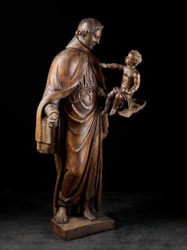 Statue en bois grandeur nature du XVIIe siècle représentant saint Antoine portant l'Enfant Jésus - 