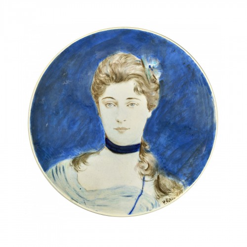 Large circular dish decorated by Paul Helleu with a portrait of his future 