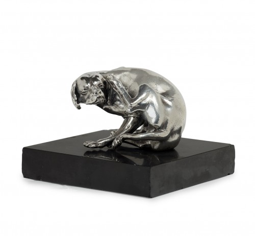 Dog scratching its ear, a 17th century silver-plated pewter sculpture 