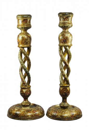 A pair of large Indian Kashmir lacquered open twist candlesticks