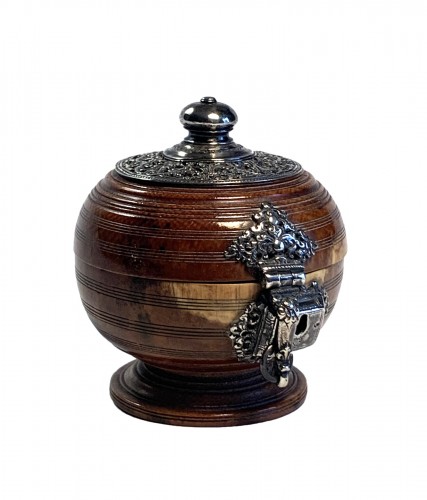 An Indo-Portuguese silver mounted turned ivory spherical box