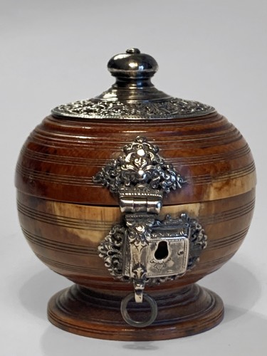 An Indo-Portuguese silver mounted turned ivory spherical box - 