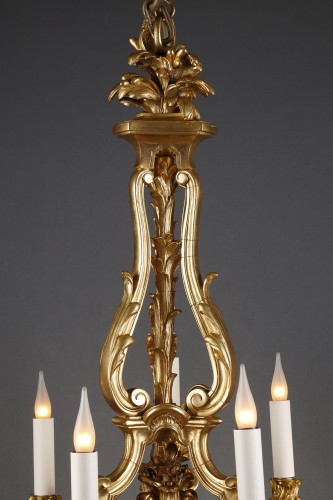 Lustre en bronze doré à 8 lumières d'après un modèle de Caffieri, France circa 1880 - Luminaires Style 