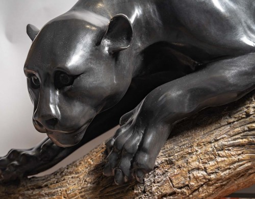 20th century - A bronze group of a panther on a branch
