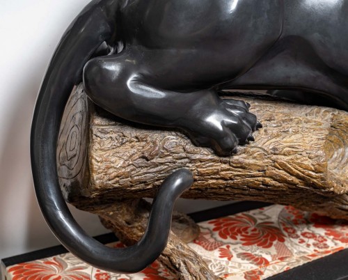  - A bronze group of a panther on a branch