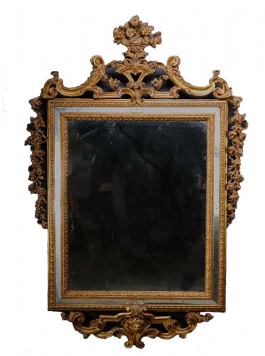 An important Louis XVI period carved and gilt mirror, Lombardy 1780