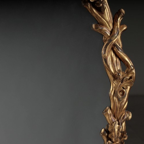 Miroirs, Trumeaux  - Un miroir ovale en bois doré de Guillaume IV