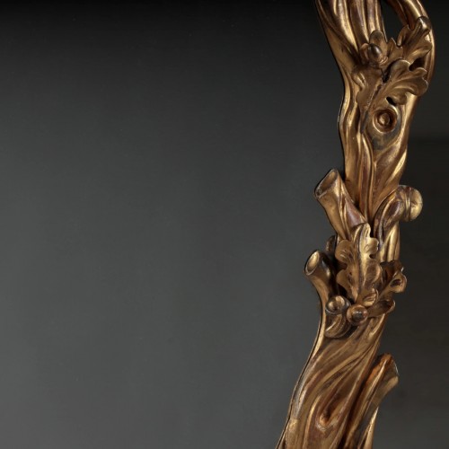 XIXe siècle - Un miroir ovale en bois doré de Guillaume IV