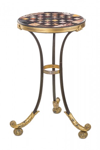 A Restauration iron gueridon with a marble marquetry top , Rome .