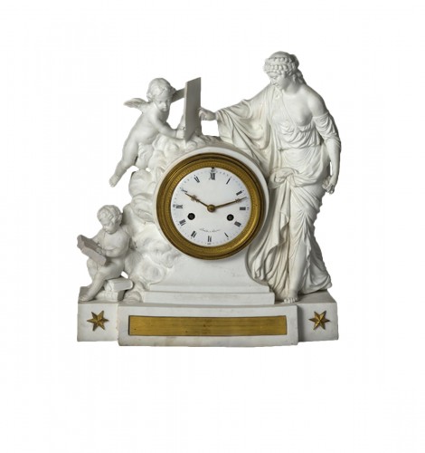 An Empire biscuit mantel clock,