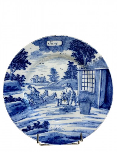 Assiette en faïence de Delft illustrant le mois de juin