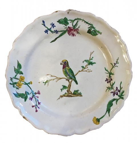 A Marseille plate decorated with a parrot